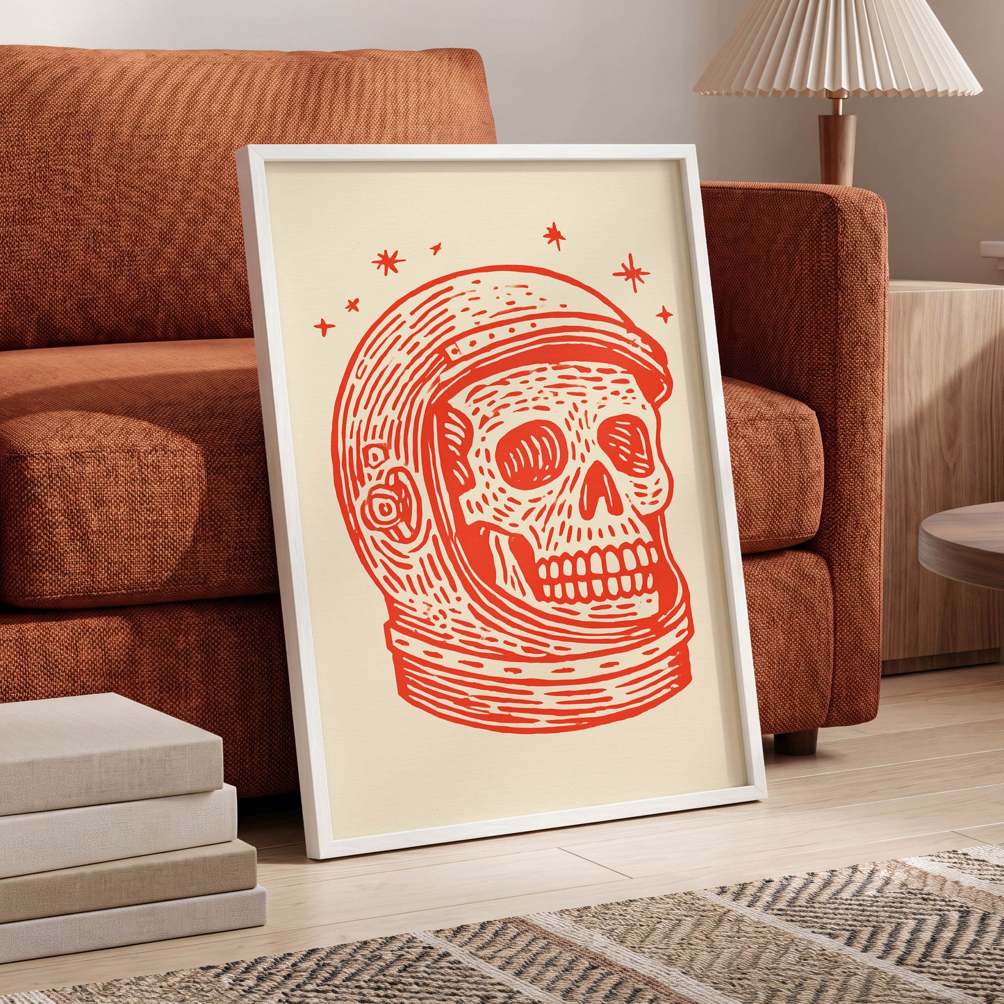 Cosmic Skull Explorer, red, orange, beige minimalist wall art displayed in a styled interior, gallery view 6