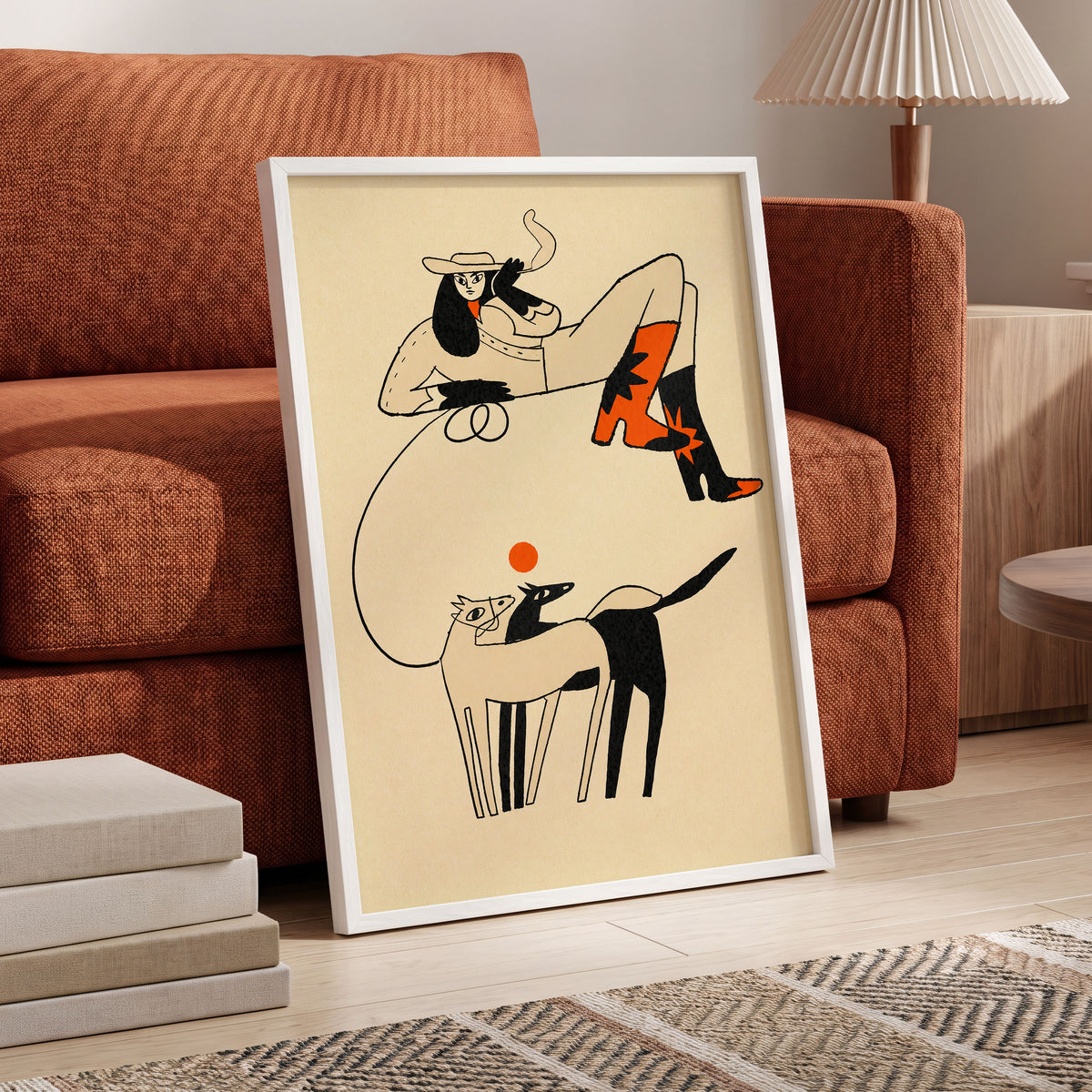 Cowgirl in Suspension, beige, black, orange abstract wall art displayed in a styled interior, gallery view 2