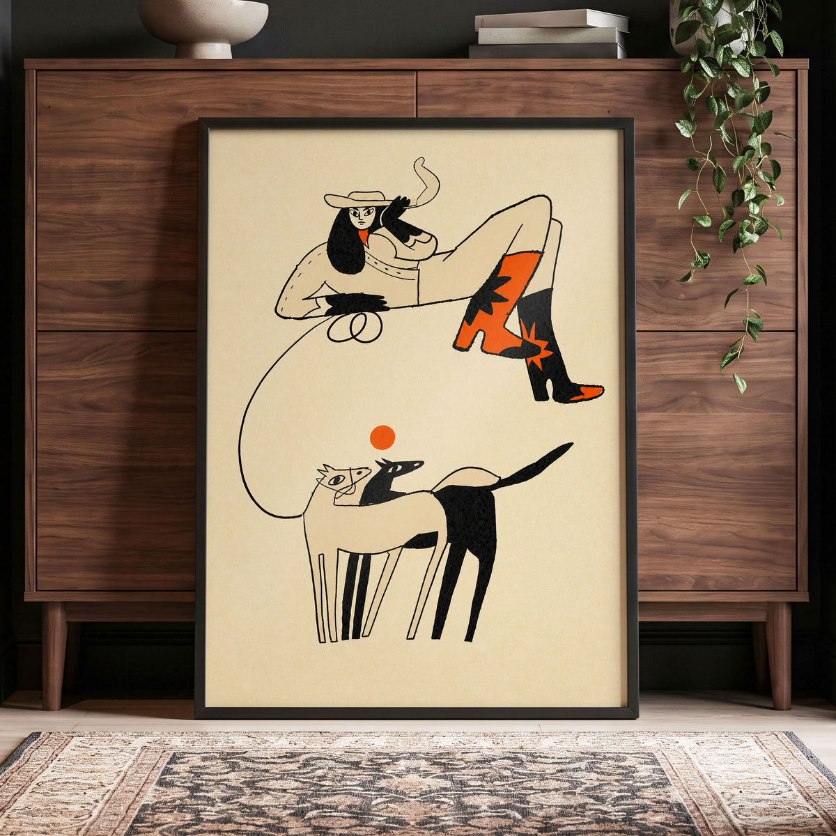 Cowgirl in Suspension, beige, black, orange abstract wall art displayed in a styled interior, gallery view 9