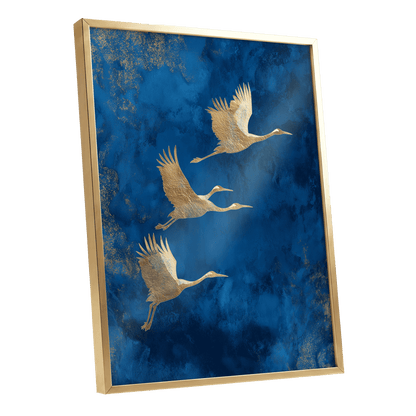 Cranes Across Cobalt, blue, gold, brown nature wall art shown as a gold framed poster wall art print