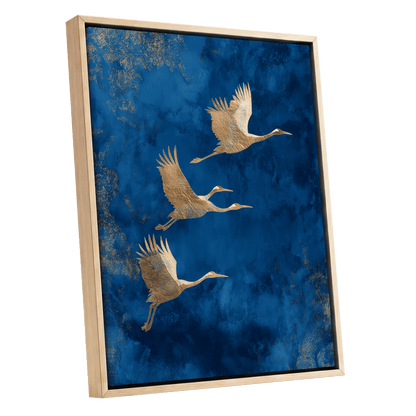 Cranes Across Cobalt, blue, gold, brown nature wall art shown as a oak framed canvas wall art