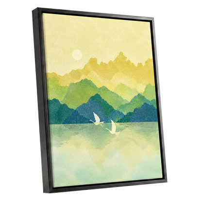 Cranes at Golden Daybreak, yellow, gold, green nature wall art shown as a black framed canvas wall art