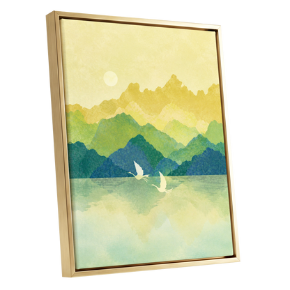Cranes at Golden Daybreak, yellow, gold, green nature wall art shown as a gold framed canvas wall art
