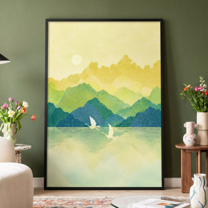 Cranes at Golden Daybreak, yellow, gold, green nature wall art displayed in a styled interior, gallery view 2