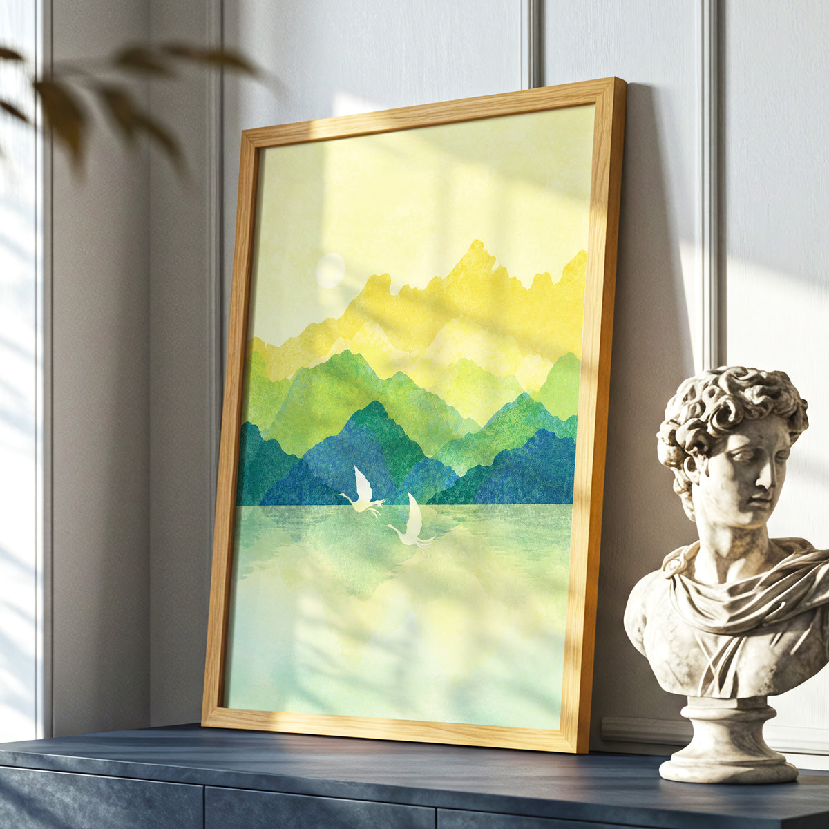 Cranes at Golden Daybreak, yellow, gold, green nature wall art displayed in a styled interior, gallery view 6
