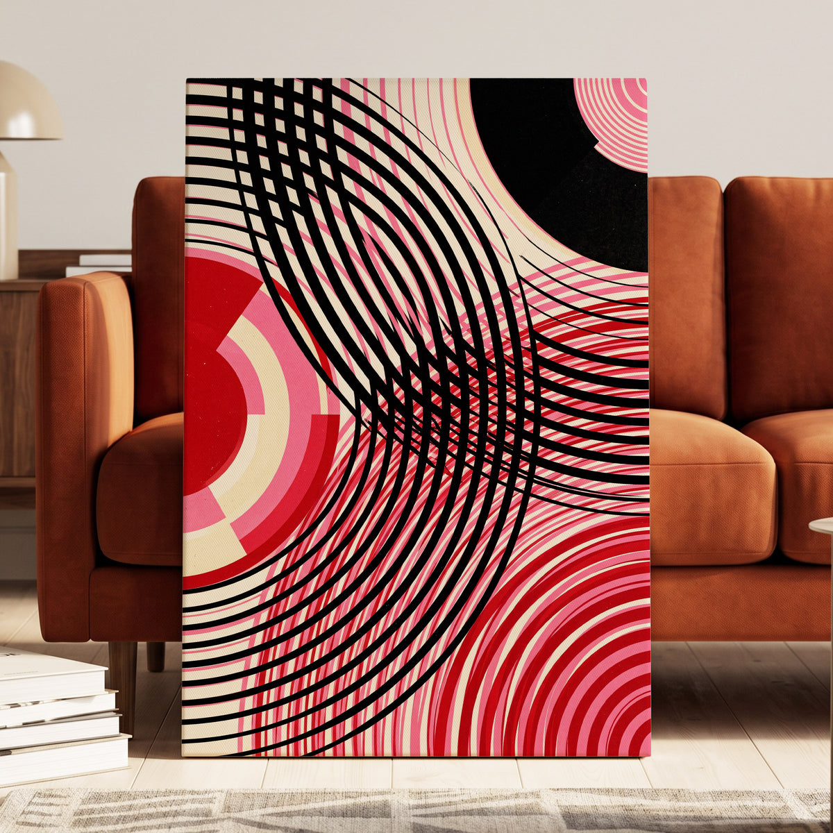 Crimson Orbit, black, pink, red abstract wall art on canvas displayed in a styled interior, gallery view 1
