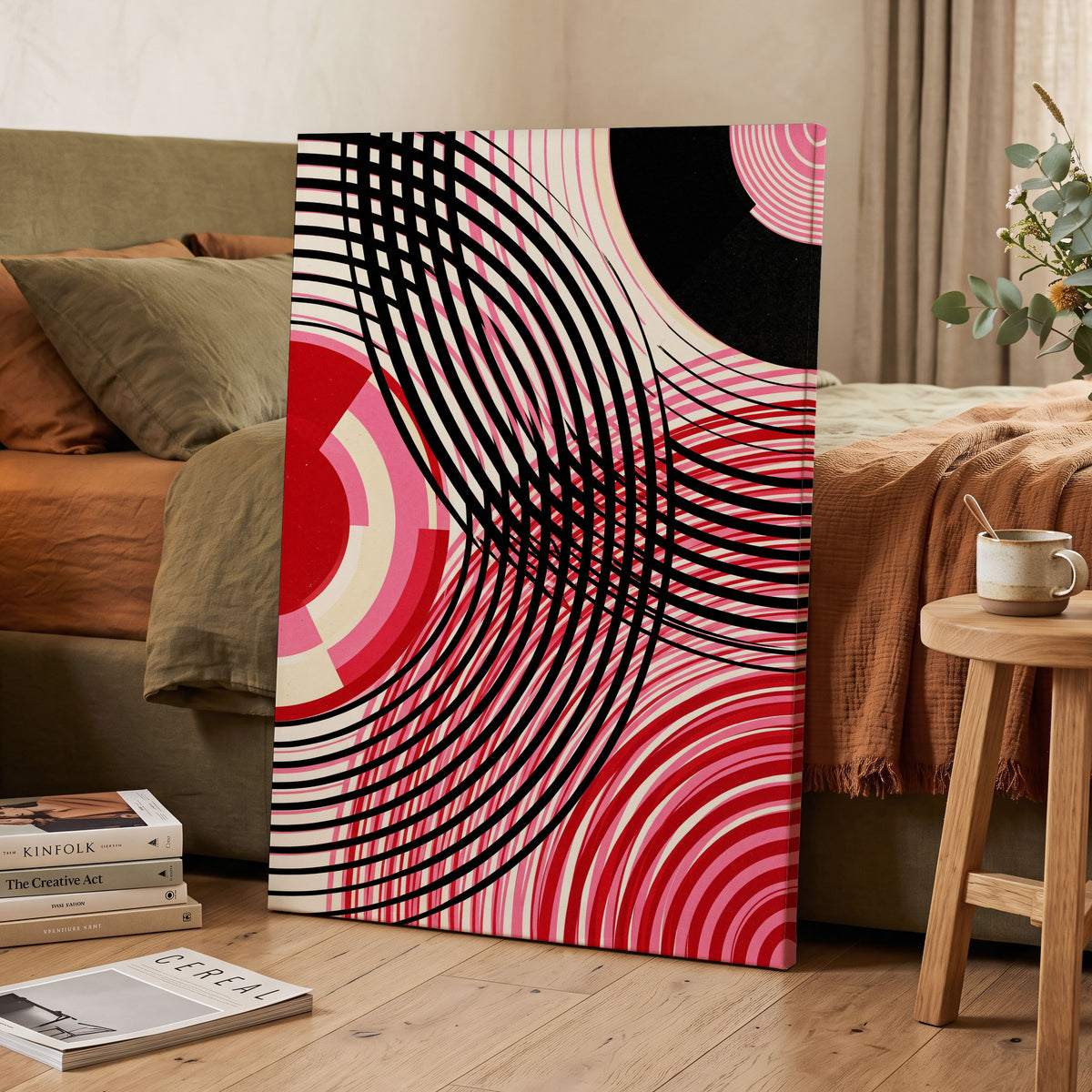 Crimson Orbit, black, pink, red abstract wall art on canvas displayed in a styled interior, gallery view 2