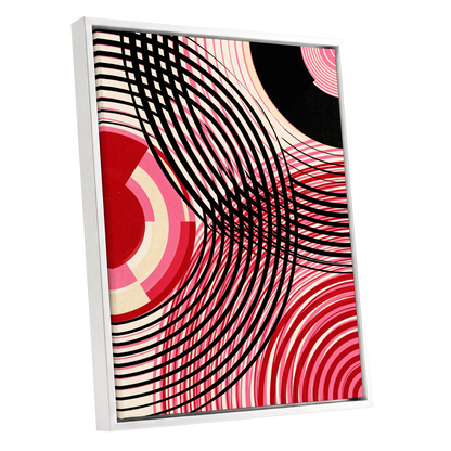 Crimson Orbit, black, pink, red abstract wall art shown as a white framed canvas wall art