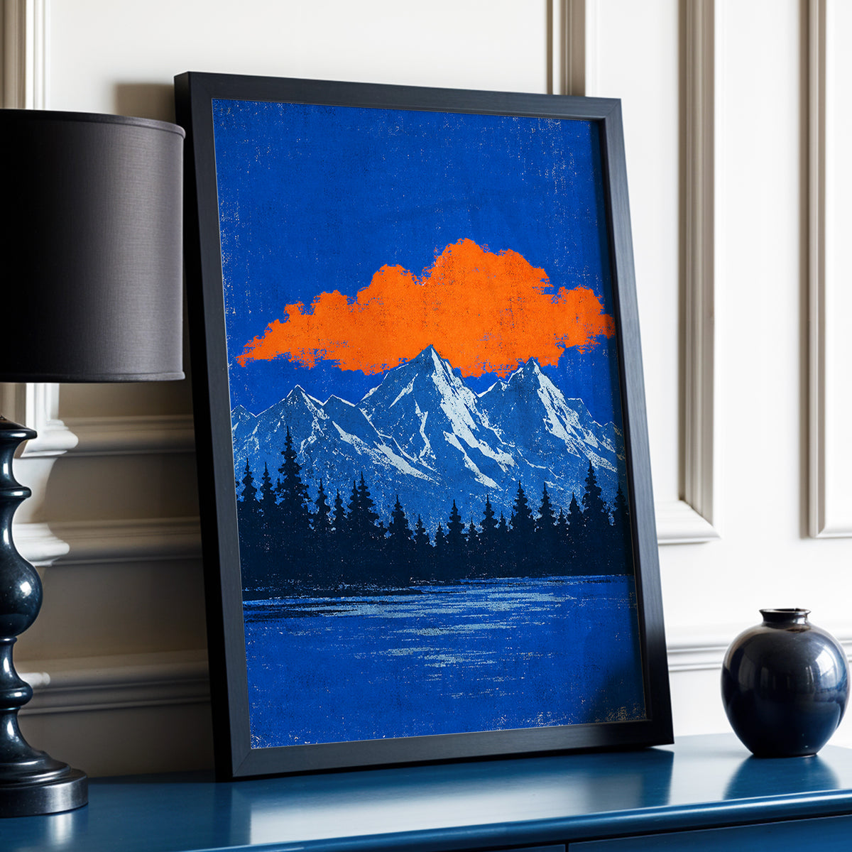 Ember Above the Peaks, blue, orange, black nature wall art displayed in a styled interior, gallery view 2