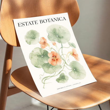 Estate Bloom Study, green, beige, orange floral wall art displayed in a styled interior, gallery view 4
