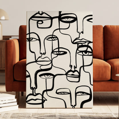 Faces in the Crowd, black, white minimalist wall art on canvas displayed in a styled interior, gallery view 2