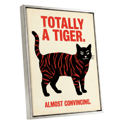 Feline in Tiger Mode, black, red, beige nature wall art shown as a silver framed canvas wall art
