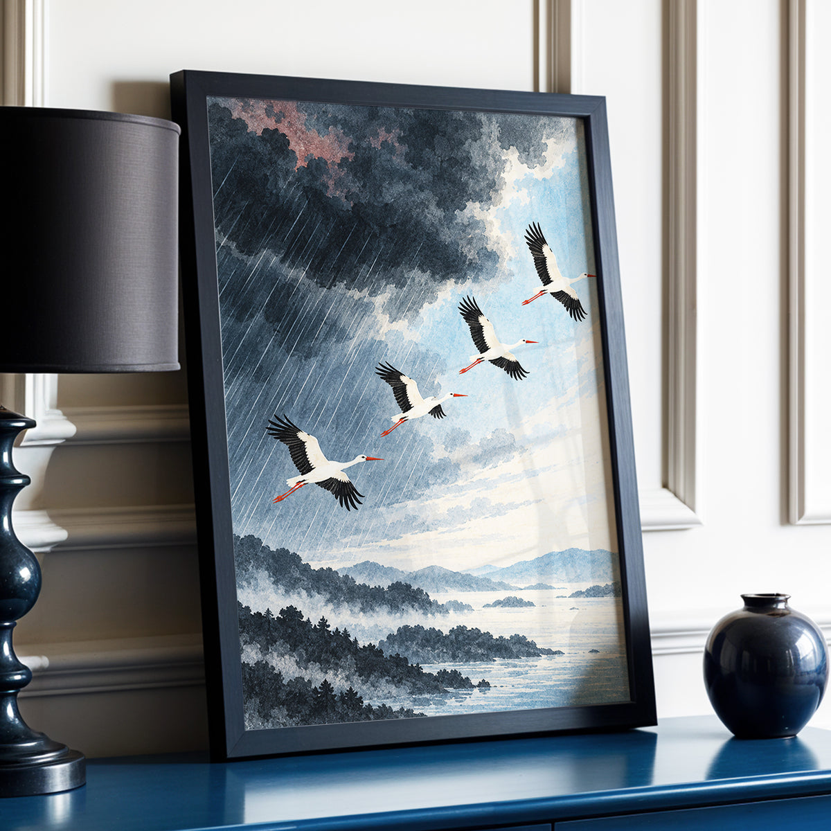 Flight Beyond the Storm, blue, gray, black nature wall art displayed in a styled interior, gallery view 2