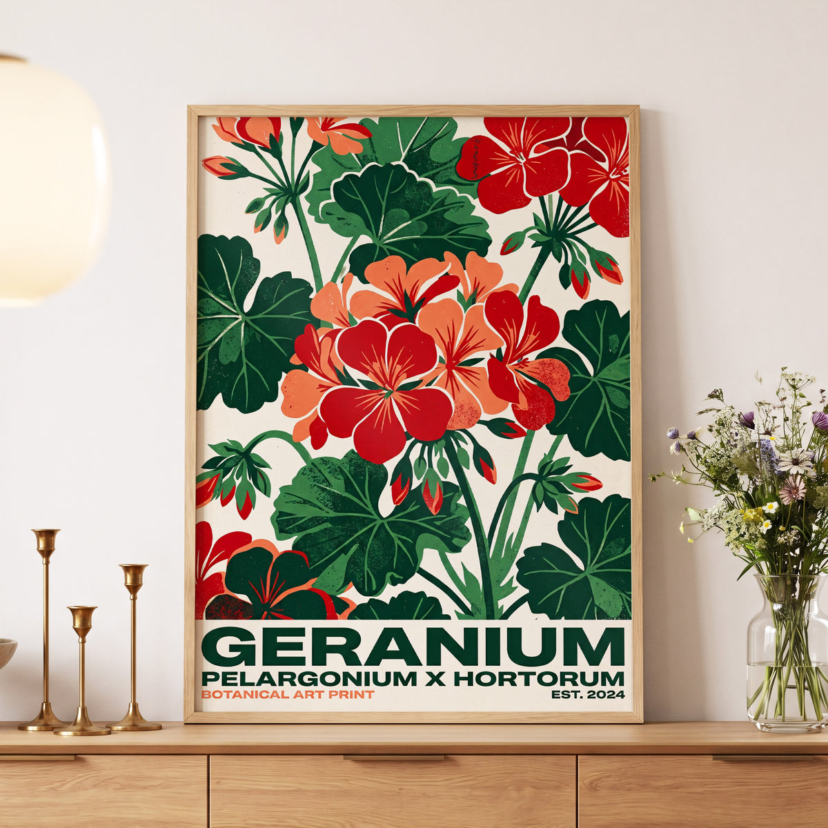 Geranium Garden, green, red, beige floral wall art displayed in a styled interior, gallery view 5