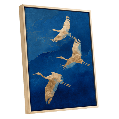 Gilded Crane Flight, blue, gold, beige nature wall art shown as a oak framed canvas wall art