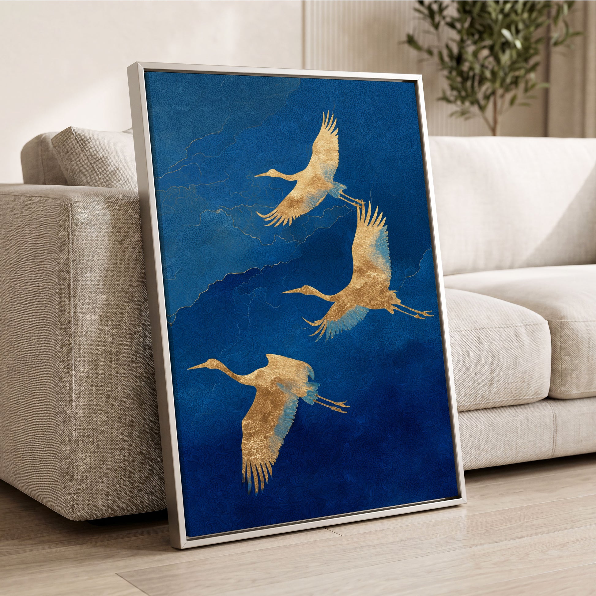 Gilded Crane Flight, blue, gold, beige nature wall art displayed in a styled interior, gallery view 2