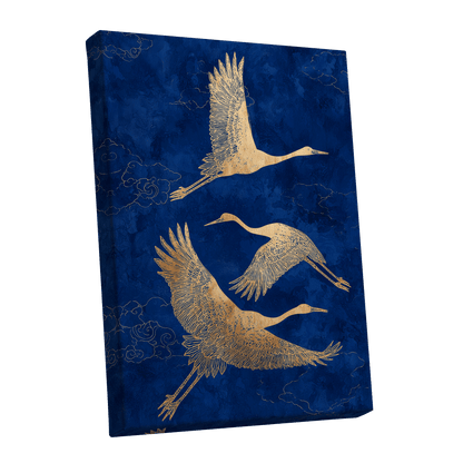 Gilded Cranes in Flight, blue, gold, beige nature wall art shown as a stretched canvas wall art
