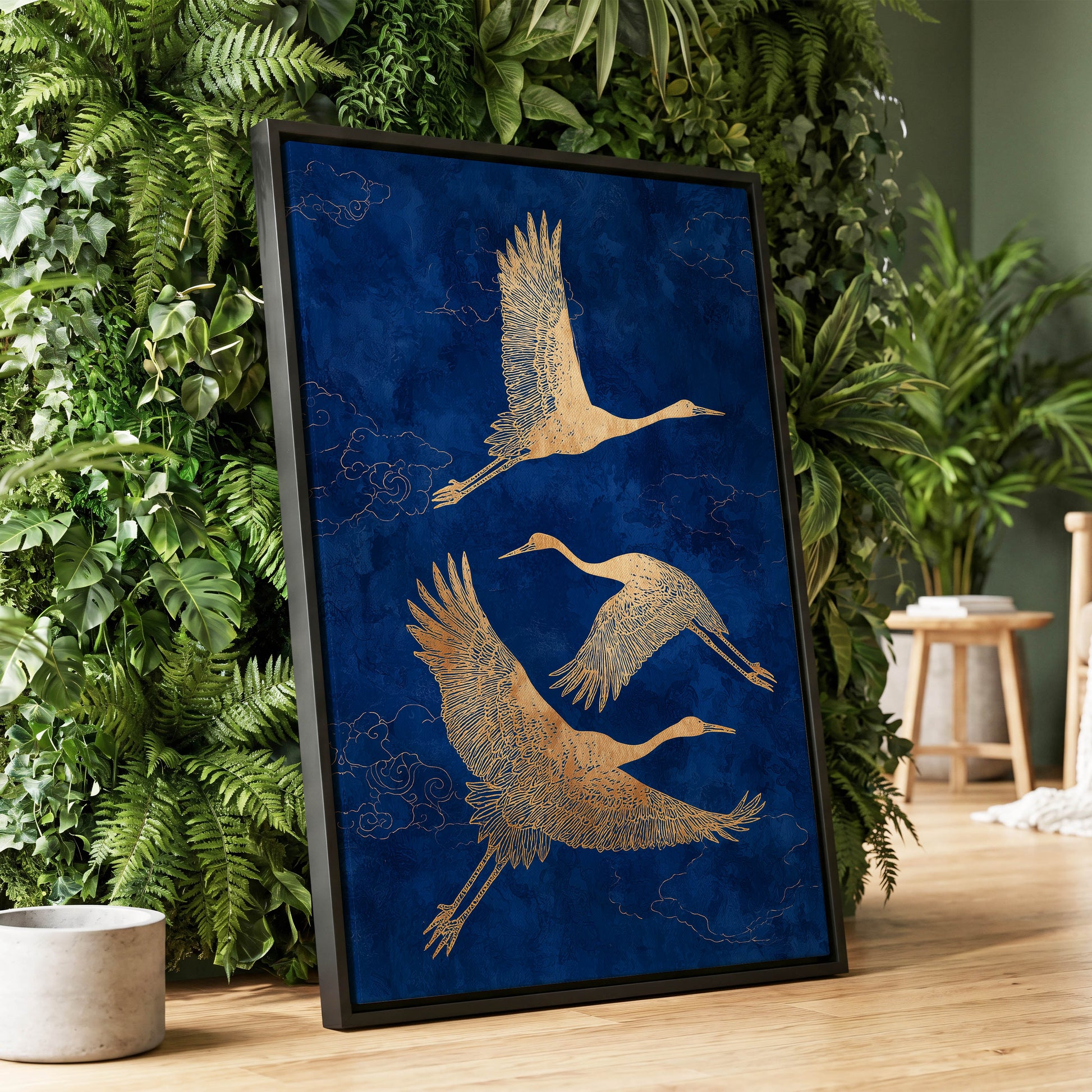 Gilded Cranes in Flight, blue, gold, beige nature wall art displayed in a styled interior, gallery view 1
