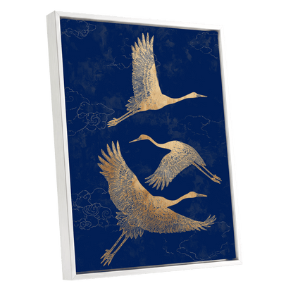 Gilded Cranes in Flight, blue, gold, beige nature wall art shown as a white framed canvas wall art