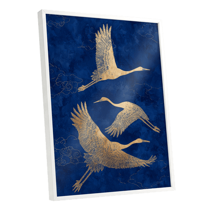 Gilded Cranes in Flight, blue, gold, beige nature wall art shown as a white framed poster wall art print