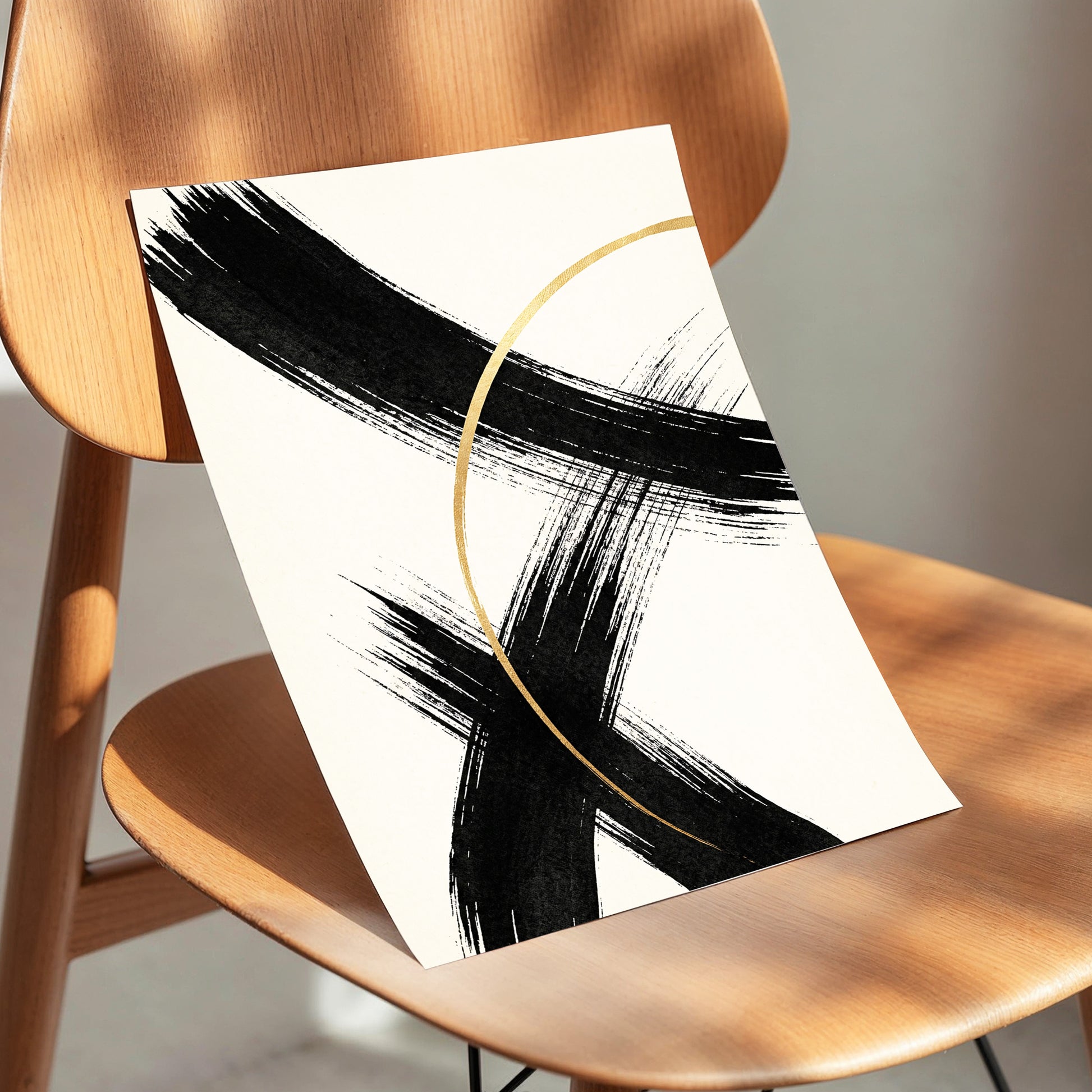 Gilded Crossing, black, beige, gold abstract wall art displayed in a styled interior, gallery view 3