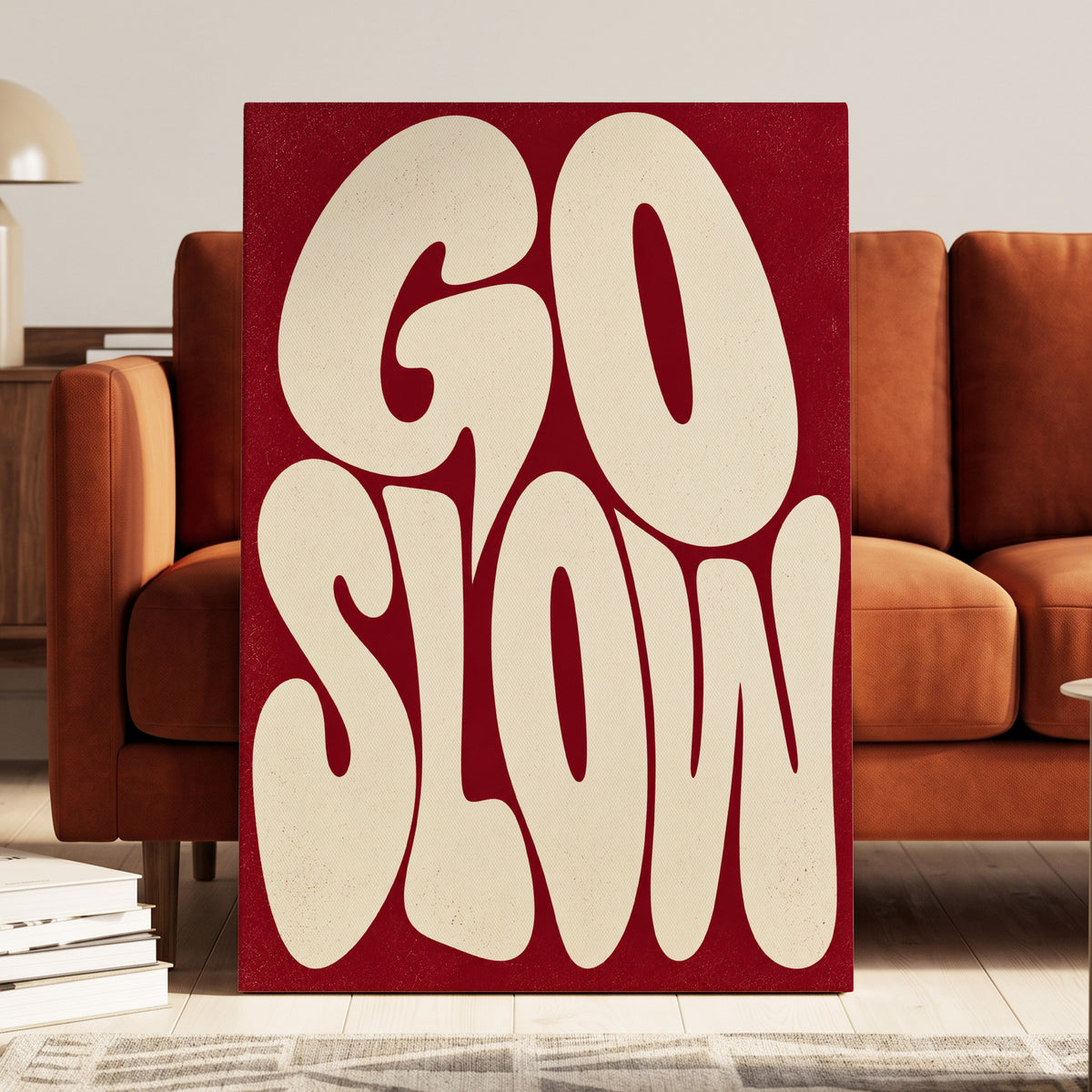 Go Slow Ruby, red, beige abstract wall art on canvas displayed in a styled interior, gallery view 1