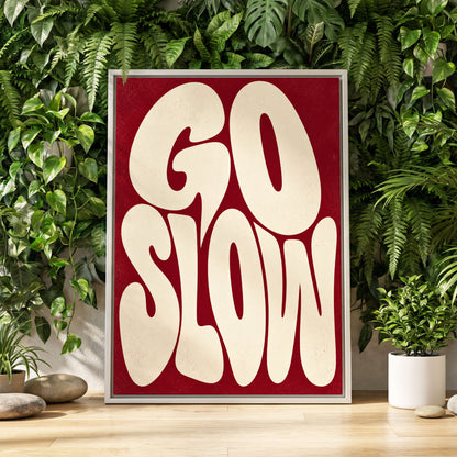 Go Slow Ruby, red, beige abstract wall art displayed in a styled interior, gallery view 1