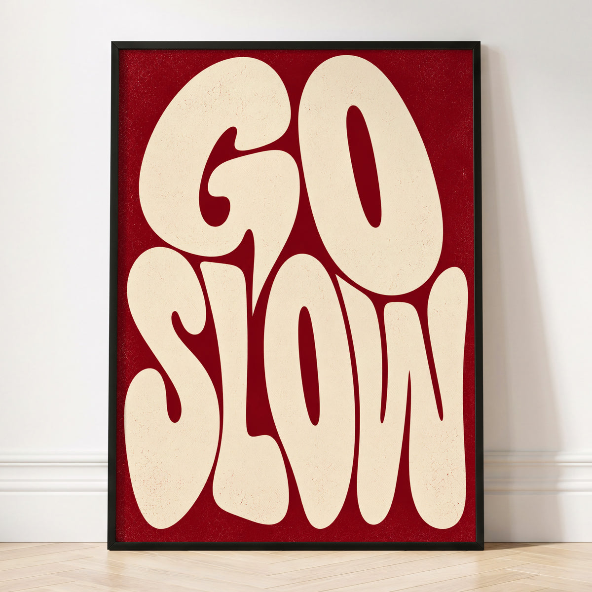 Go Slow Ruby, red, beige abstract wall art displayed in a styled interior, gallery view 3