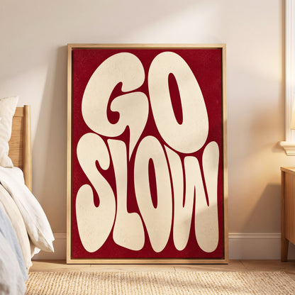 Go Slow Ruby, red, beige abstract wall art displayed in a styled interior, gallery view 5