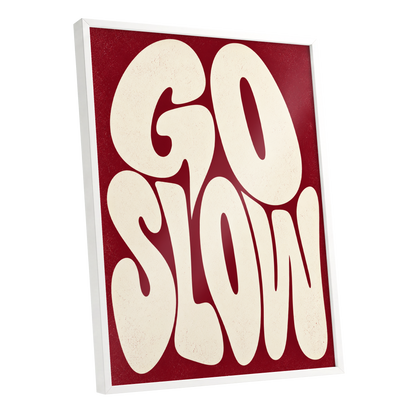 Go Slow Ruby, red, beige abstract wall art shown as a white framed poster wall art print