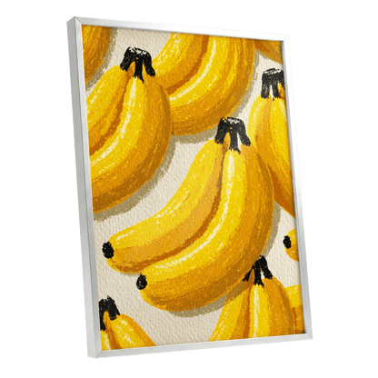Golden Banana Parade, yellow, gold, orange nature wall art shown as a silver framed poster wall art print