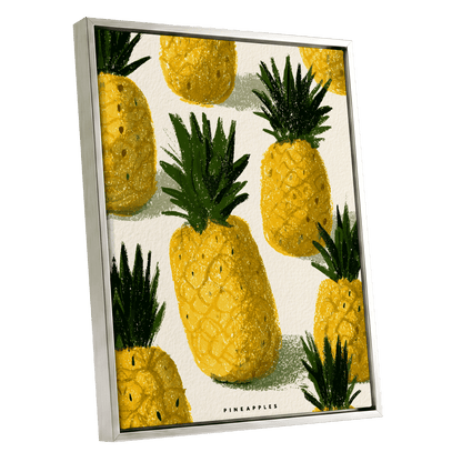 Golden Pineapple Parade, yellow, gold, green nature wall art shown as a silver framed canvas wall art
