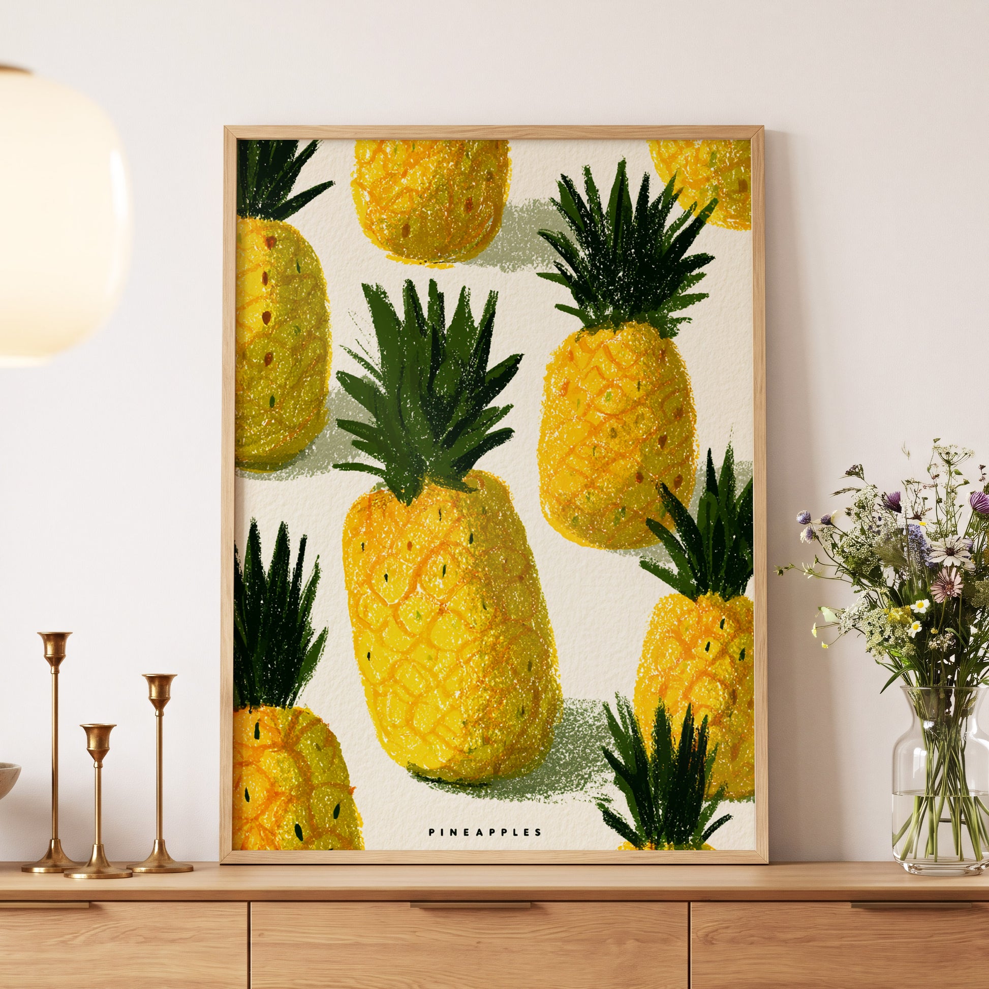 Golden Pineapple Parade, yellow, gold, green nature wall art displayed in a styled interior, gallery view 5