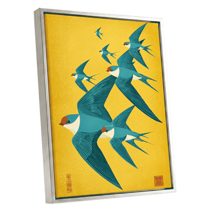 Golden Swallow Flight, gold, blue, beige nature wall art shown as a silver framed canvas wall art