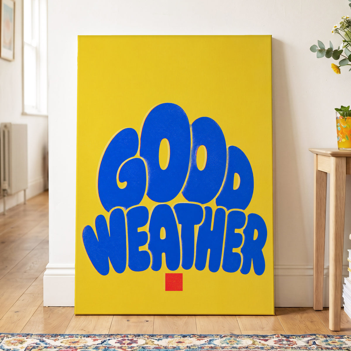 Good Weather Glow, blue, yellow, red minimalist wall art on canvas displayed in a styled interior, gallery view 2