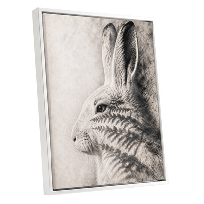 Hare in Hushed Light, white, gray, black nature wall art shown as a white framed canvas wall art