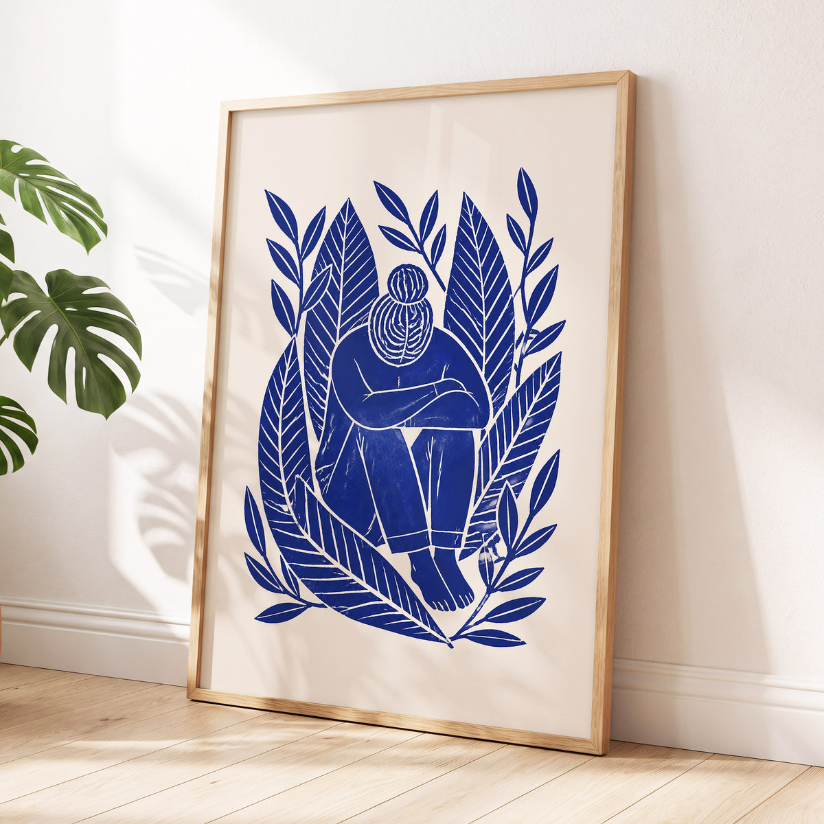 Indigo Leaf Embrace, blue, beige, white nature wall art displayed in a styled interior, gallery view 2