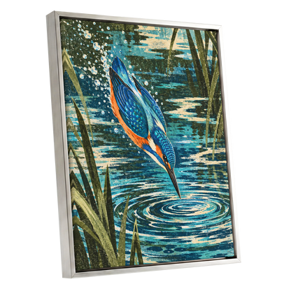 Kingfisher in Motion, blue, orange, green nature wall art shown as a silver framed canvas wall art