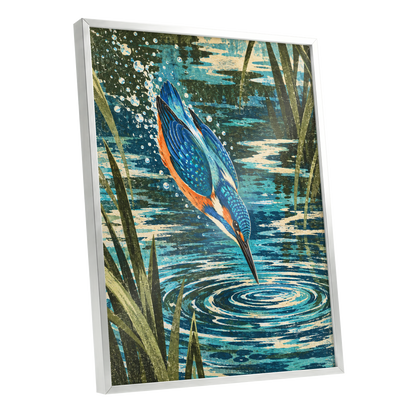 Kingfisher in Motion, blue, orange, green nature wall art shown as a silver framed poster wall art print