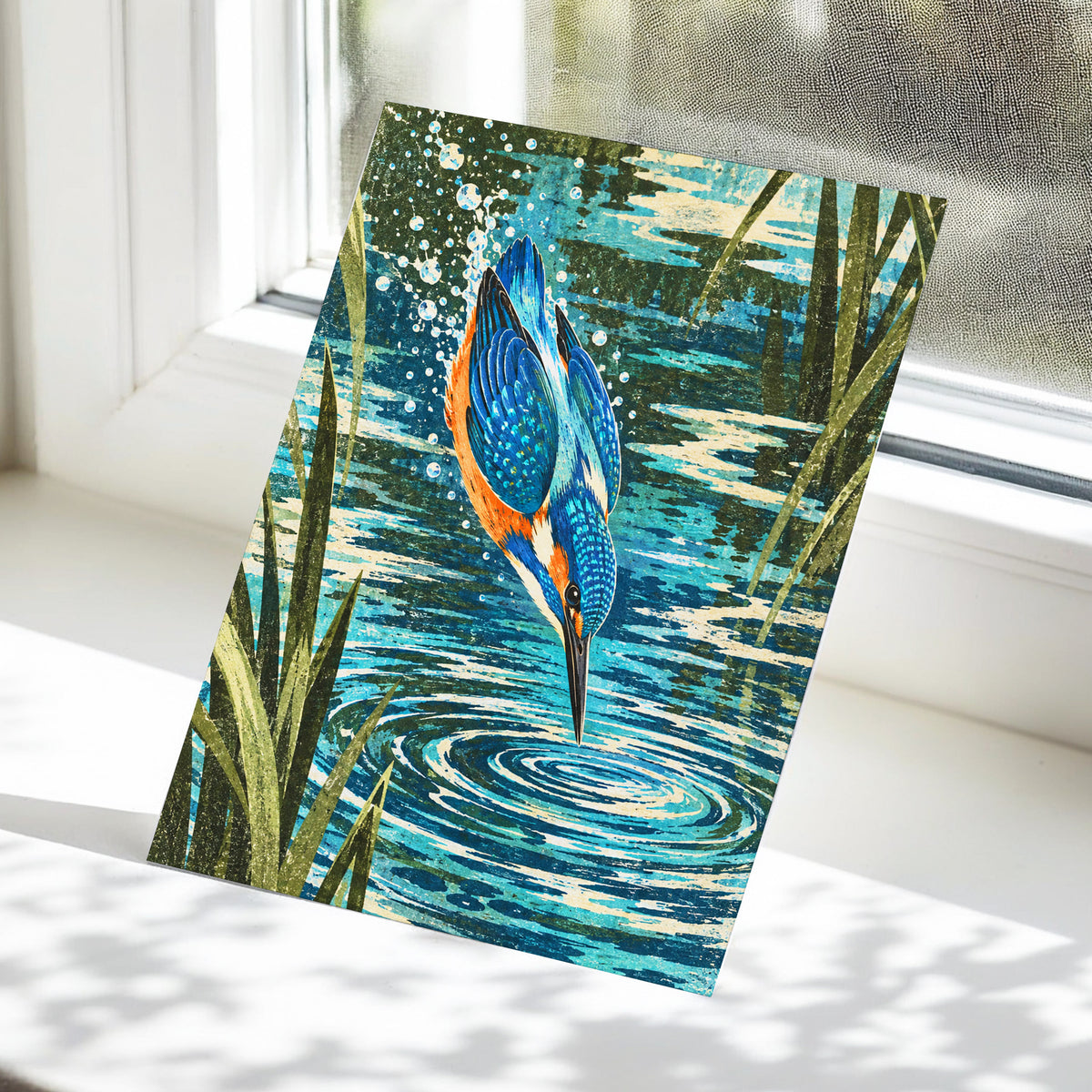Kingfisher in Motion, blue, orange, green nature wall art displayed in a styled interior, gallery view 5