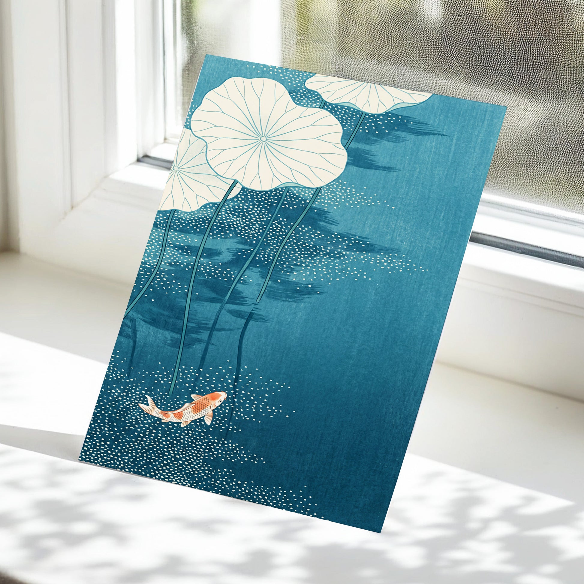 Koi Beneath Lotus Leaves, blue, beige, white nature wall art displayed in a styled interior, gallery view 5