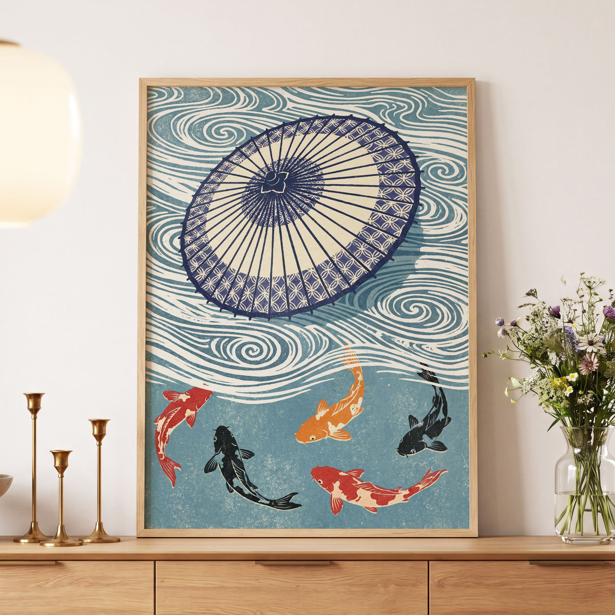 Koi Beneath the Parasol, blue, beige, black nature wall art displayed in a styled interior, gallery view 6