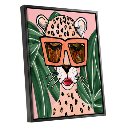Leopard in Coral Shades, pink, green, orange nature wall art shown as a black framed canvas wall art