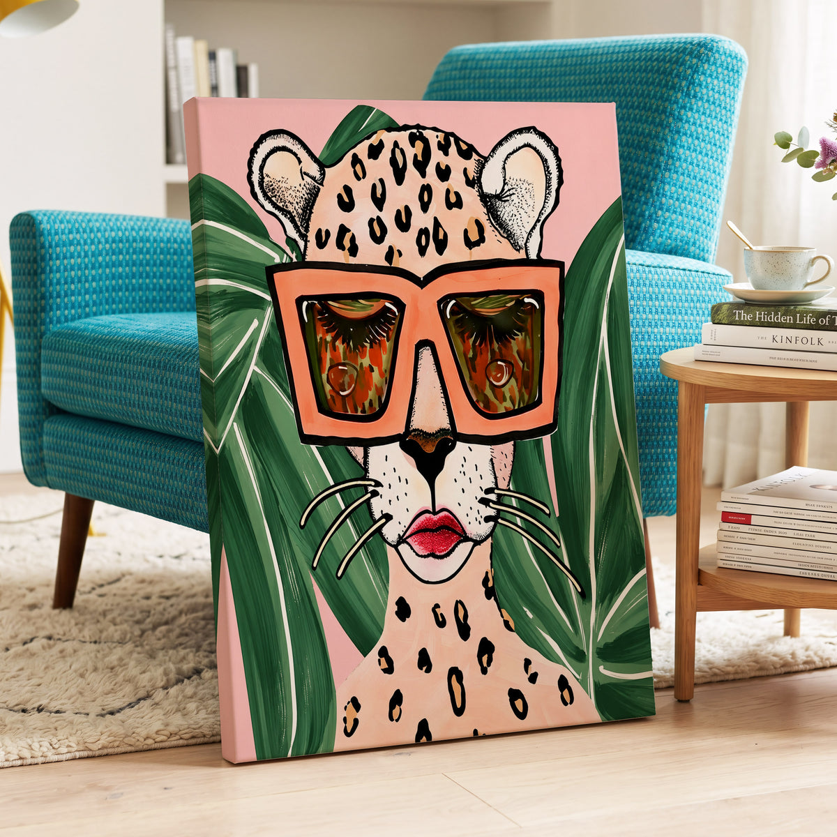 Leopard in Coral Shades, pink, green, orange nature wall art on canvas displayed in a styled interior, gallery view 1