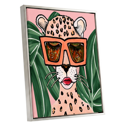 Leopard in Coral Shades, pink, green, orange nature wall art shown as a silver framed canvas wall art
