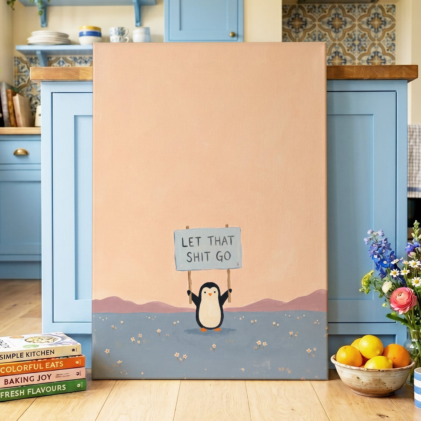 Let It Go Penguin, pink, blue, purple nature wall art displayed in a styled interior, gallery view 3