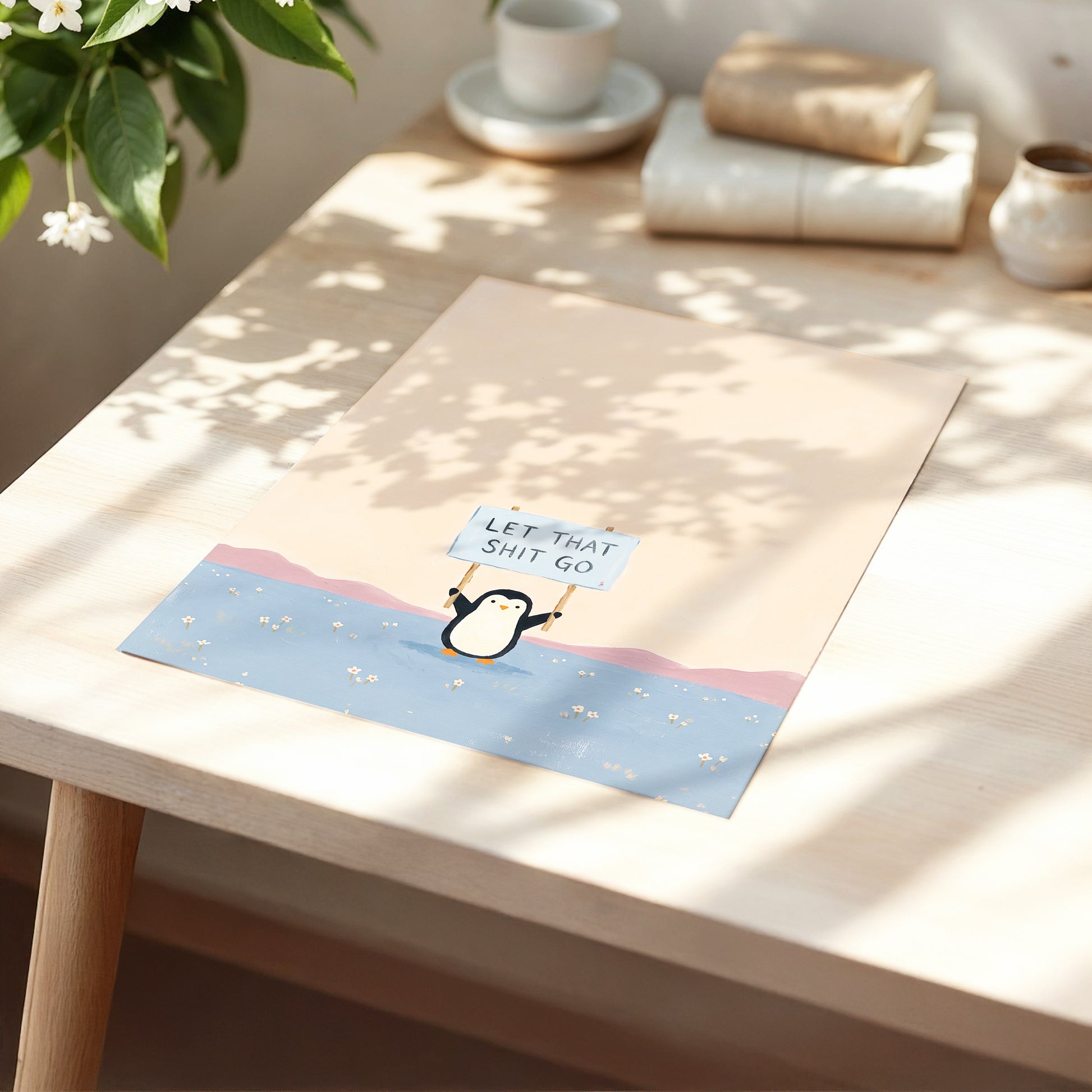 Let It Go Penguin, pink, blue, purple nature wall art displayed in a styled interior, gallery view 5