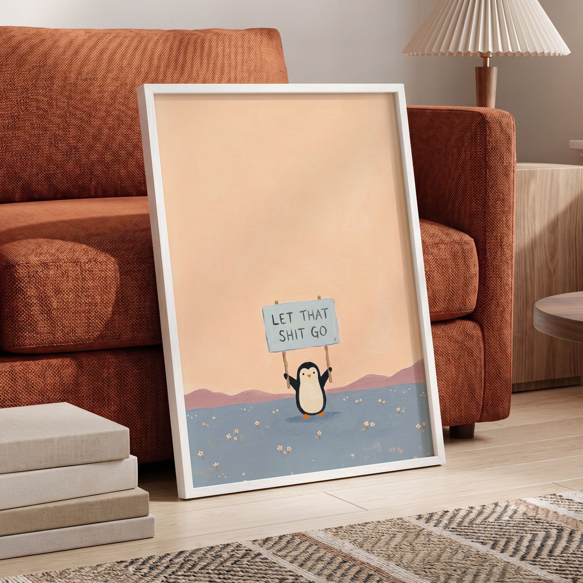 Let It Go Penguin, pink, blue, purple nature wall art displayed in a styled interior, gallery view 6
