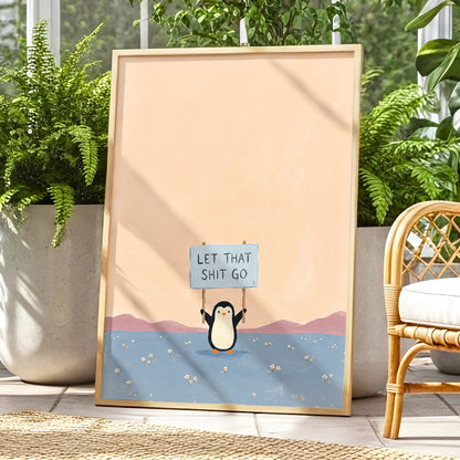 Let It Go Penguin, pink, blue, purple nature wall art displayed in a styled interior, gallery view 9