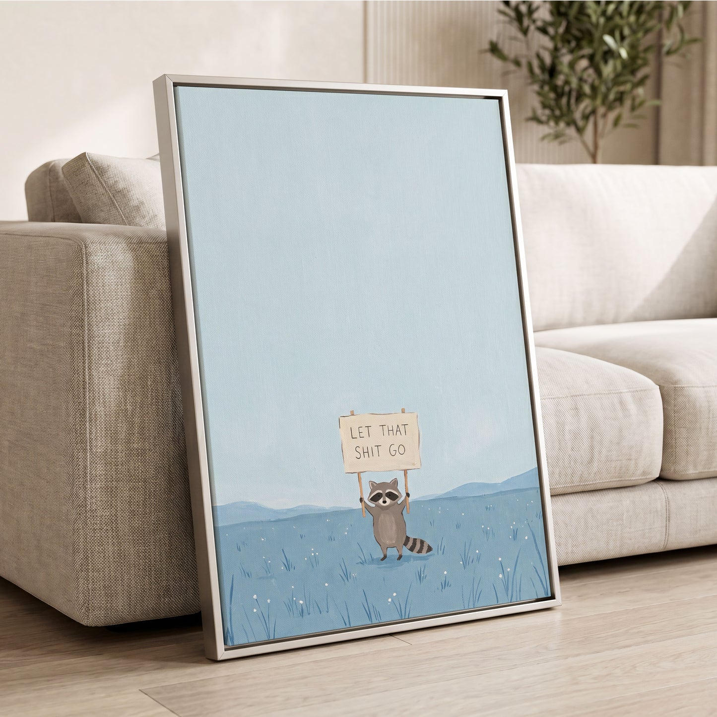 Let It Go Raccoon, blue, beige, gray nature wall art displayed in a styled interior, gallery view 8
